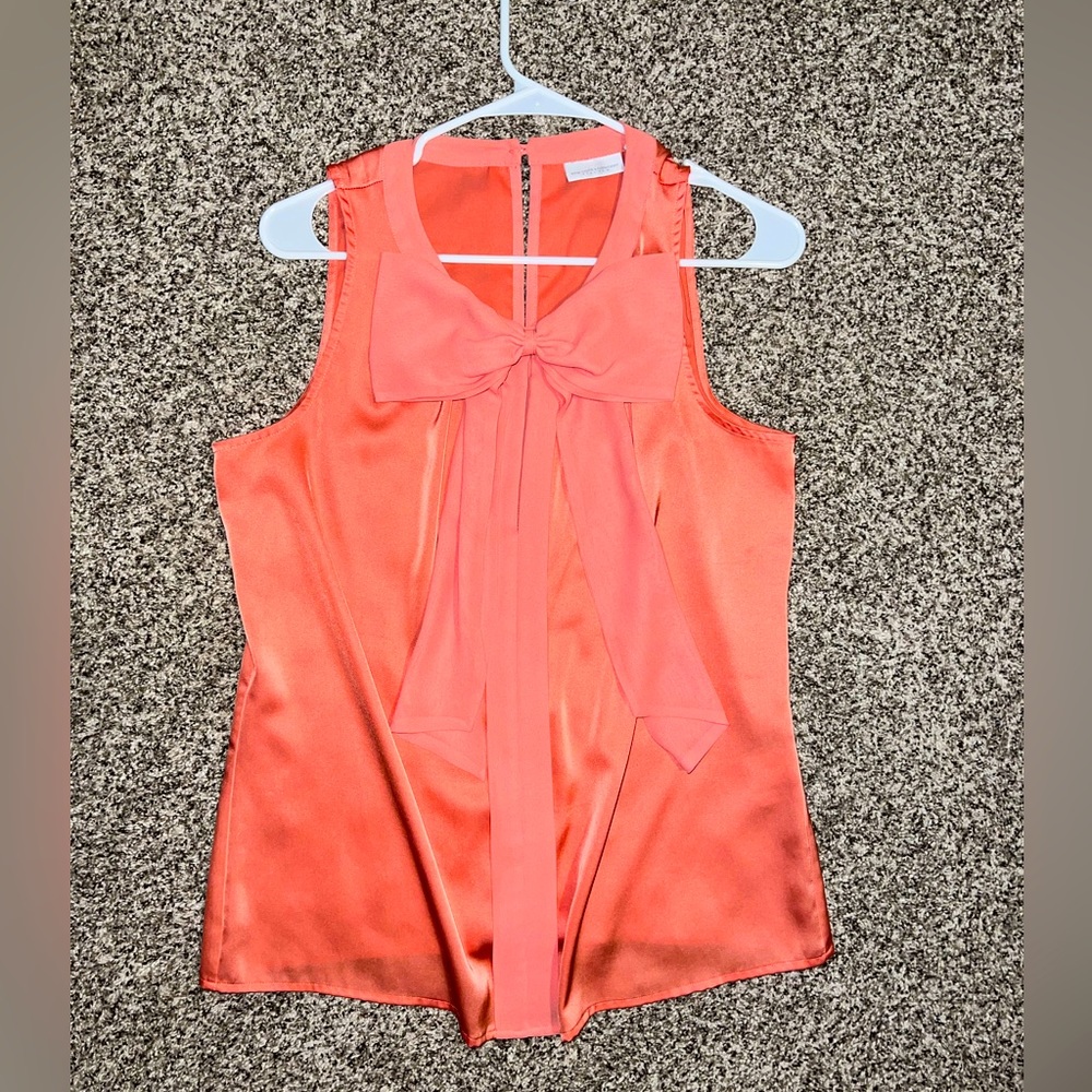 Coral colored blouse with bow